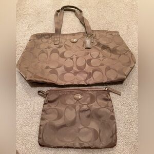 Coach golden brown brass color foldable travel tote with zipper.